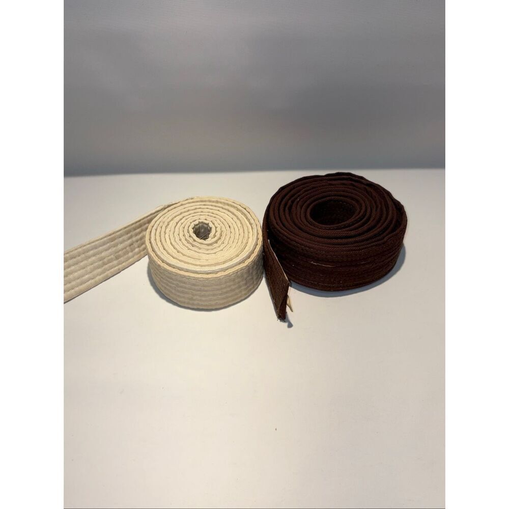 A white and brown karate belts